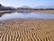 Chalkida / Greece - December 22, 2010: Beach with sand ripples  during low tide, Liani Ammos in Chalkida, Greece