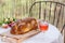 Challah bread on round table served with Amber wine