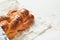 Challah bread. Sabbath kiddush ceremony composition. Freshly baked homemade braided challah bread for Shabbat and Holidays on