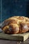 Challah or Hala is a traditional jewish sweet fresh sabbath bread loaf, fresh bun on cutting board. Brioche bread on breakfast