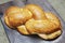 Challah or Hallah - Jewish bread in Israel and at Jewish diaspora abroad. Challah on kitchen wooden board