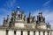 Chambord castle is located in Loir-et-Cher, France. It has a very distinct French Renaissance architecture which blends tradition