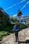 Chame - A hiking man posing in Himalayan village