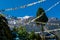 Chame - Prayer flags waving above Himalayan peaks