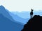 A chamois stands on top of a hill with mountains in the background. Black silhouette with blue background.