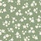 Chamomile floral mille fleur seamless pattern on green background. Small summer flowers in simple scandinavian cartoon