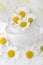 Chamomile flowers and cream