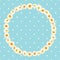 Chamomile pattern on blue polka dot background. Daisy chain. Round frame for your text or photo.