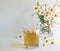 Chamomile tea, chamomile in glass, sedative drink, clear tea in glass, yellow tea