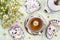 Chamomile tea with decorative gingerbread cookies background