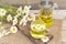 chamomile tea is a therapeutic healthy drink A teapot with a cup on a wooden background A bouquet of daisies on the