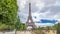 Champ de Mars and the Eiffel Tower timelapse hyperlapse in a sunny summer day. Paris, France