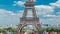 Champ de Mars and the Eiffel Tower timelapse in a sunny summer day. Paris, France