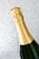 Champagne bottle cup on brilliant silver background