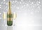 Champagne bottle with two full glasses on blurred background