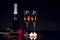 Champagne bottle with two wine glasses and red rose