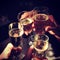 champagne celebrate celebration flute glasses four toast clinking hands holding