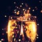 Champagne glass against sparkler background