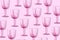 Champagne glass pattern on pink background with copy space for text. Top view. Holiday and celebration concept. Packing design.