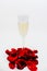 champagne glass with rose leaves abstract background