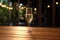 Champagne glass template mockup, alcoholic beverage on the wood table on a cozy background.