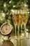 Champagne glasses, clock with lights