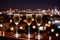 Champagne glasses flutes on balcony overlooking city, festive special occasion