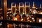 Champagne glasses flutes on balcony overlooking city, festive special occasion