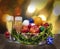 Champagne glasses fruits apples and tangerines Christmas tree toys balls cones in Christmas basket