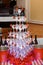 Champagne glasses at the party. Pyramid of champagne. Festive alcohol . Collective drunkenness.