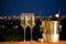 Champagne at night with city skyline