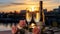 Champagne and rose. Two glasses of champagne on rooftop and cityscape view with twilight sunset time. Generative AI