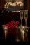 Champagne and roses on dark table for romantic dinner date night heart bokeh