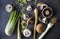 Champignons, leek, parsnip, garlic and fennel on grey background. Top view photo of fresh seasonal vegetables. Healthy menu ideas.