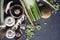 Champignons, leek, parsnip, garlic and fennel on grey background. Top view photo of fresh seasonal vegetables. Healthy menu ideas.