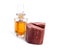 Chandan or red sandalwood piece isolated on white baclground. With essential oil