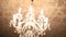 Chandelier in the apartment. A beautiful chandelier on the ceili