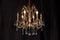 Chandelier, luxury retro style on dark background.