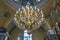 chandelier in the temple,a chandelier shines under the dome in the church, the interior of the old church, Ukraine Mervichy June
