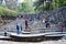 Chandigarh, India - January 4, 2015: People visit Rock statues at the rock garden