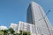 Chang glass buildings in Bangkok city with blue sky background showing its design and traffic. Bangkok, Thailand April 14, 2018