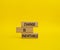 Change is Inevitable symbol. Wooden blocks with words Change is Inevitable. Beautiful yellow background. Business and Change is