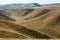 Changes of grass color on Tibetan mountains slopes