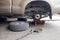 Changing car wheel in garage. Tools and accessories about car. R