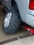 Changing new mud tires on a pick up truck