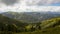 Changing seasons transition from summer to autumn. Mountain scenery. Time lapse