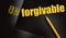 Changing the word Unforgivable for Forgivable and yellow pencil. Social concept
