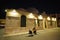 Chania, Crete, 01 October 2018 A musician plays outside the Hasan Mosque, Ottoman-style mosque located opposite the Venetian port