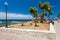 Chania, Crete, Greece- 26 June, 2016: Lamps, trees and summer house are on the Embankment of Mediterranean Sea