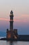 Chania lighthouse at sunset.